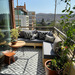 Terraza con sofá de 3 cuerpos y banca movible + sector de plantas - Terraza mediana 2.jpg