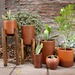 Portamacetero de madera de pallets reciclados - portamaceteros de madera levantar plantas.jpg